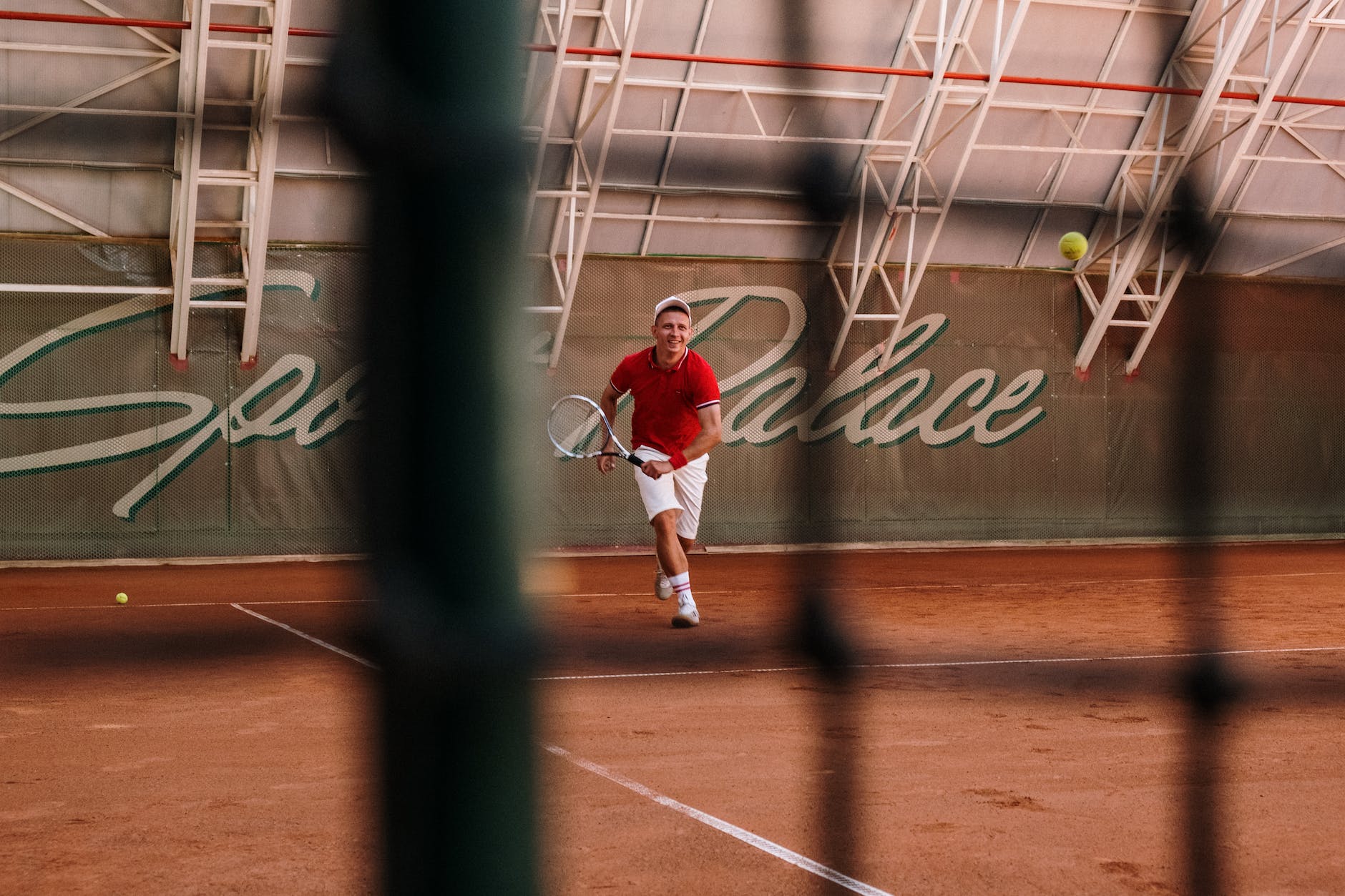 a man in red polo shirt